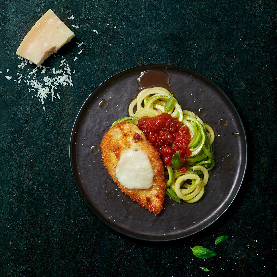 Chicken escalope with mozzarella cheese and zoodles with tomato sauce