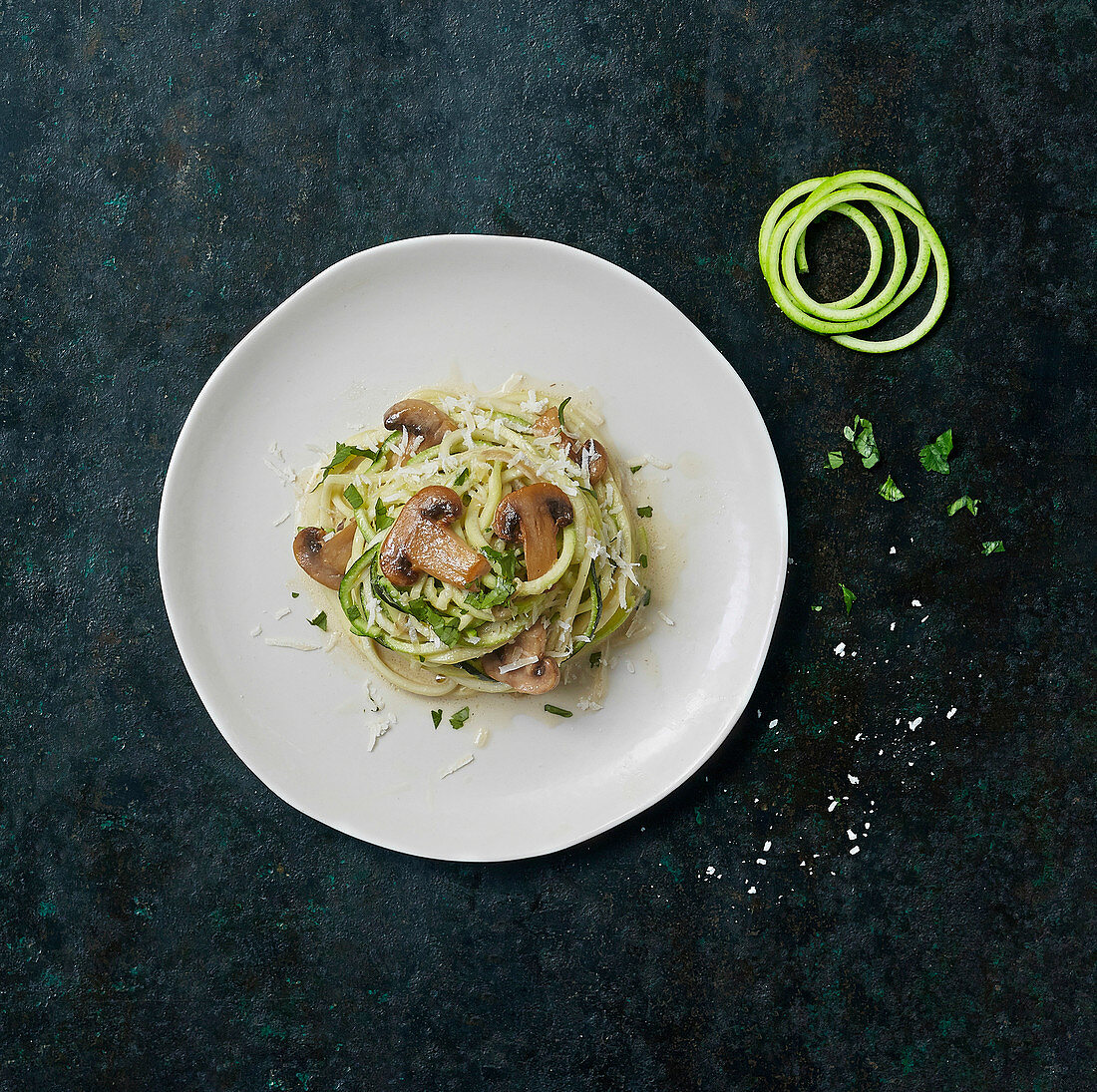 Zoodles with mushrooms and grated cheese