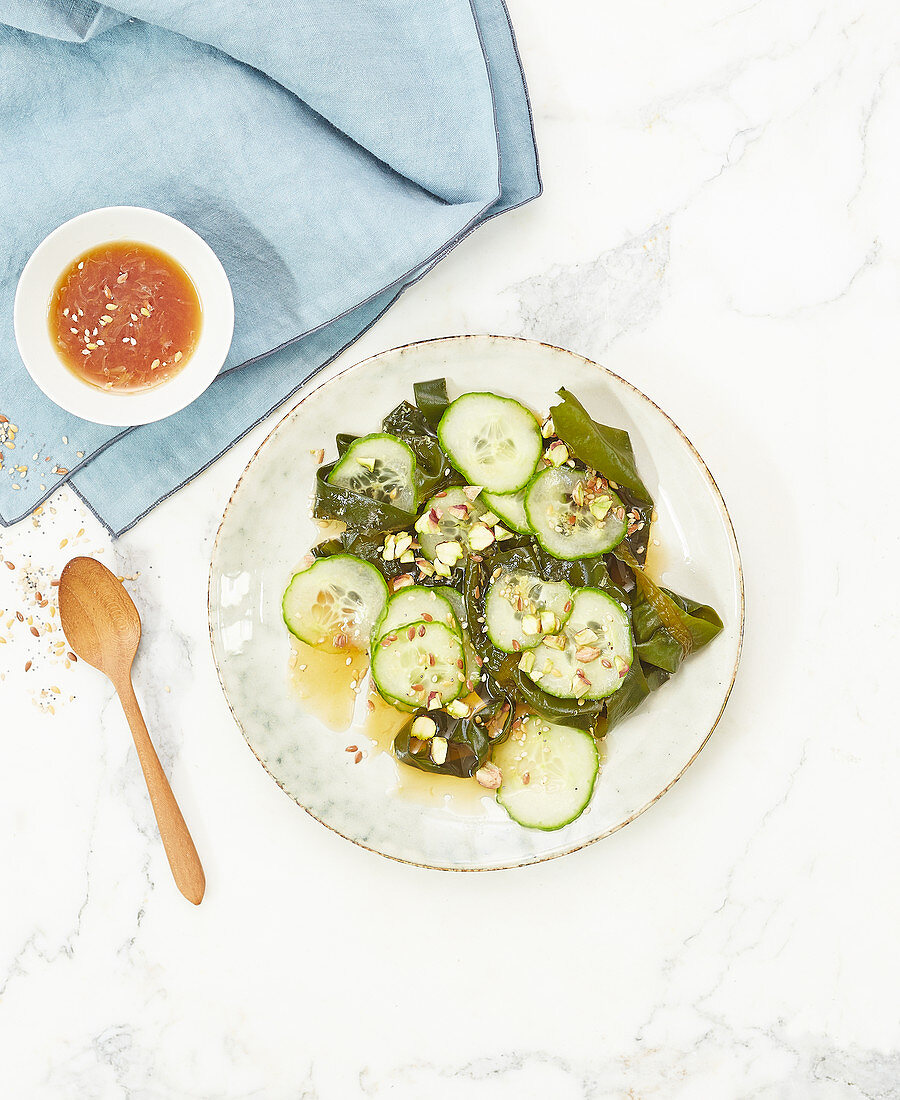 Cucumber salad with seaweed and chopped nuts