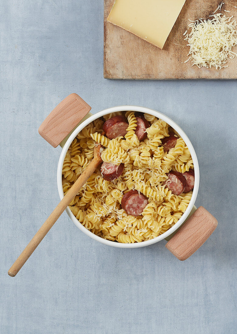 Fusilli with sausage and grated Comté cheese