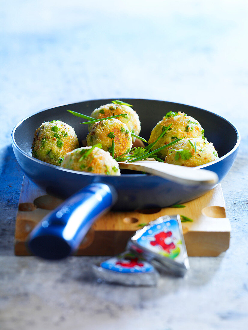 Cheese balls with vegetables and vache qui rit