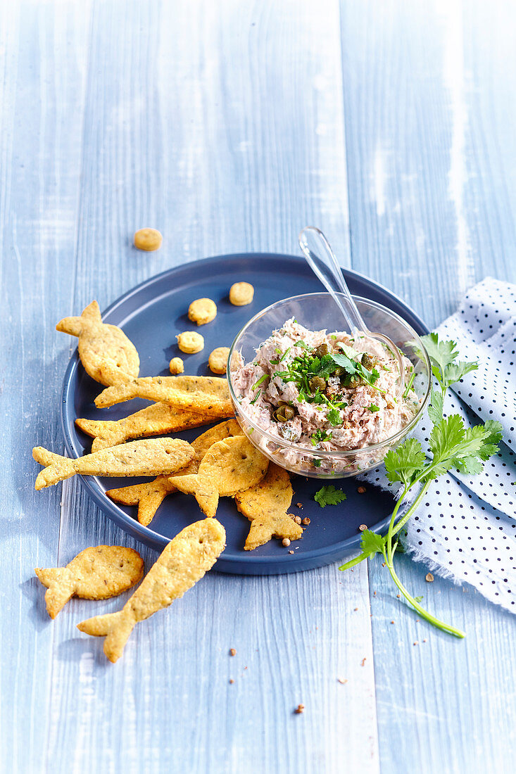 Potted sardine spread with fish-shaped crackers