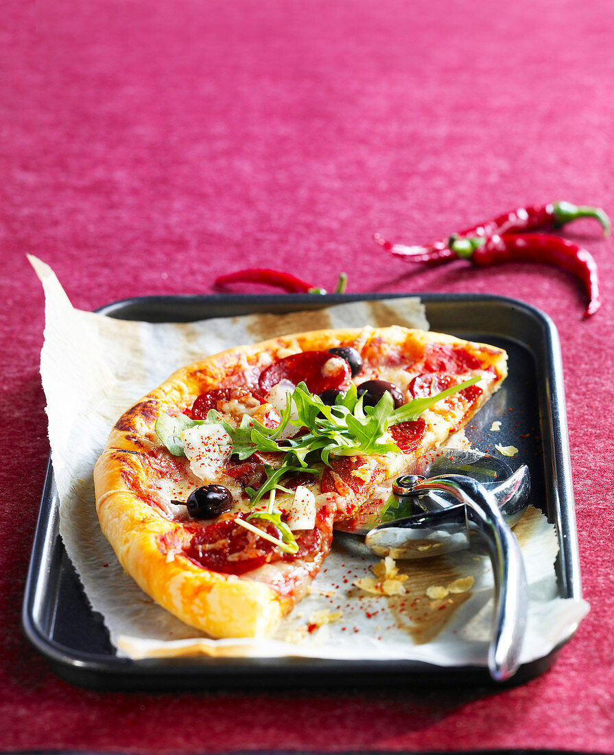 Pizza with chorizo and olives