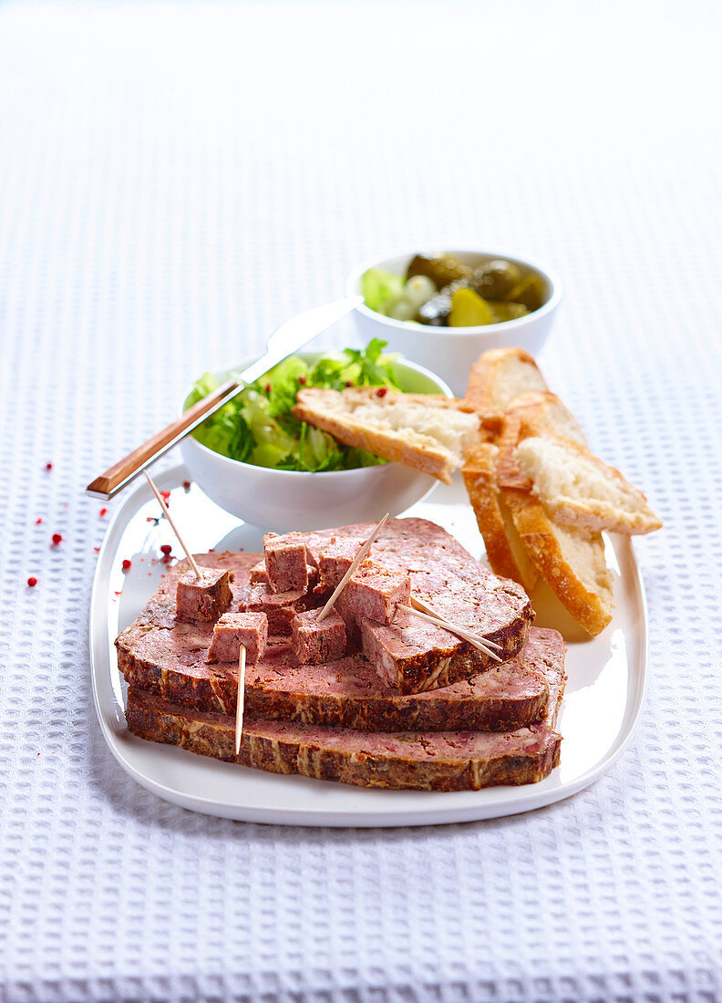 Sliced and diced terrine with wooden picks