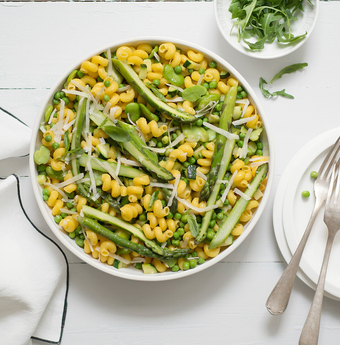 Cavatappi pasta with asparagus, peas, broad beans and parmesan cheese