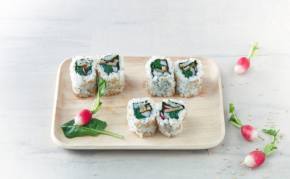 Vegetarian sushi with spinach and radish