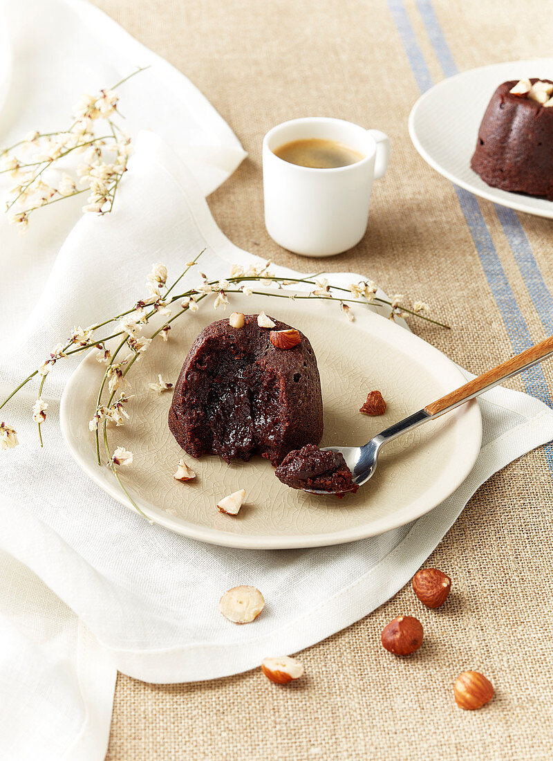 Chocolate hazelnut cake with a liquid centre and hazelnuts