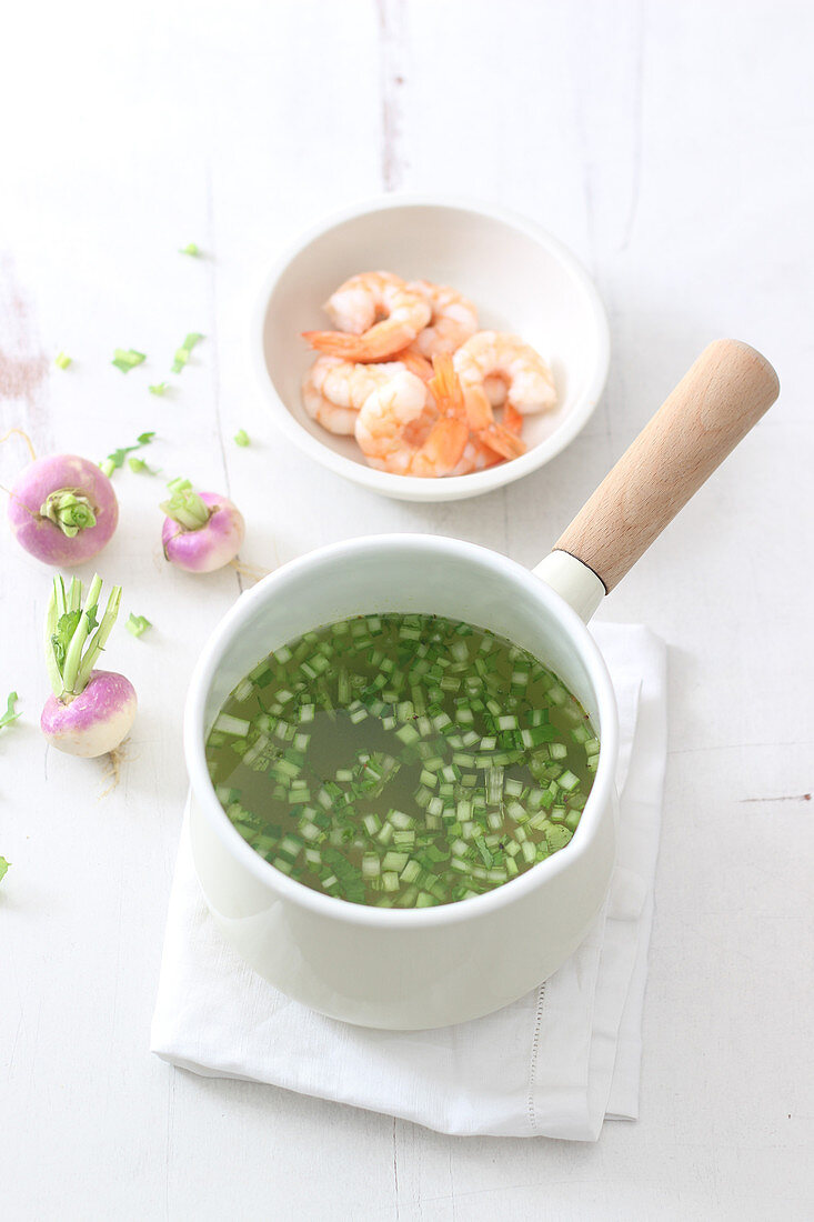 Soup ingredients: Stock, prawns and turnips