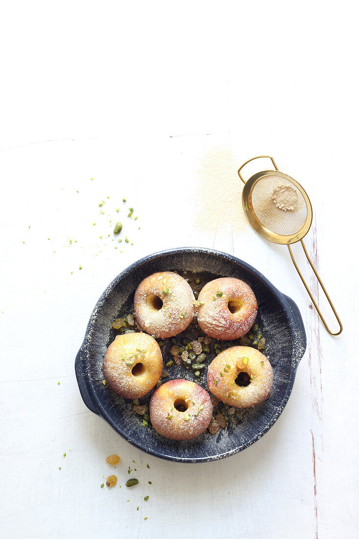 Baked apples with pistachios and sultanas