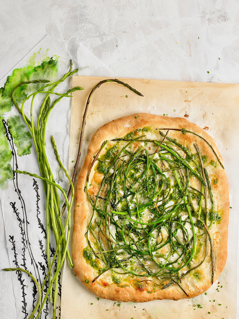 Pizza with green wild asparagus
