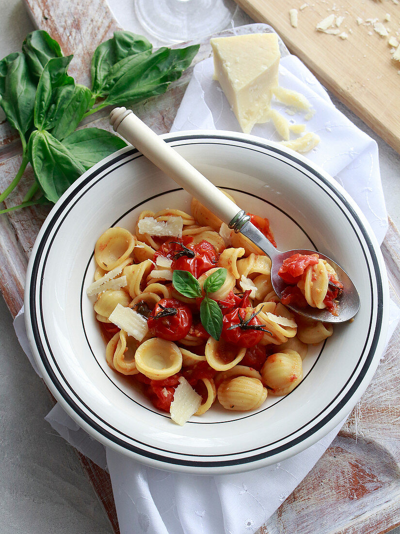 Orecchiette with confit tomatoes and basil