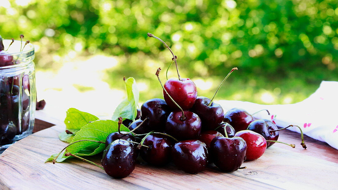 Fresh cherries on a garden table