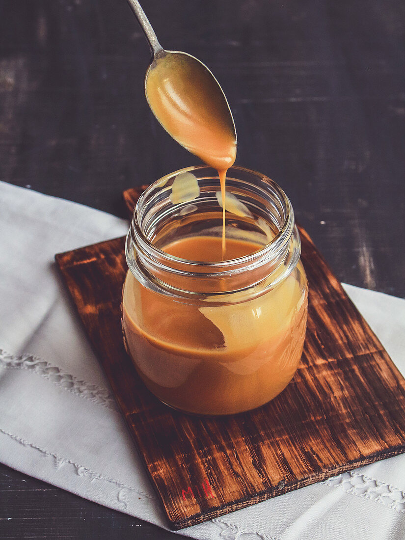 Salted caramel sauce in a glass