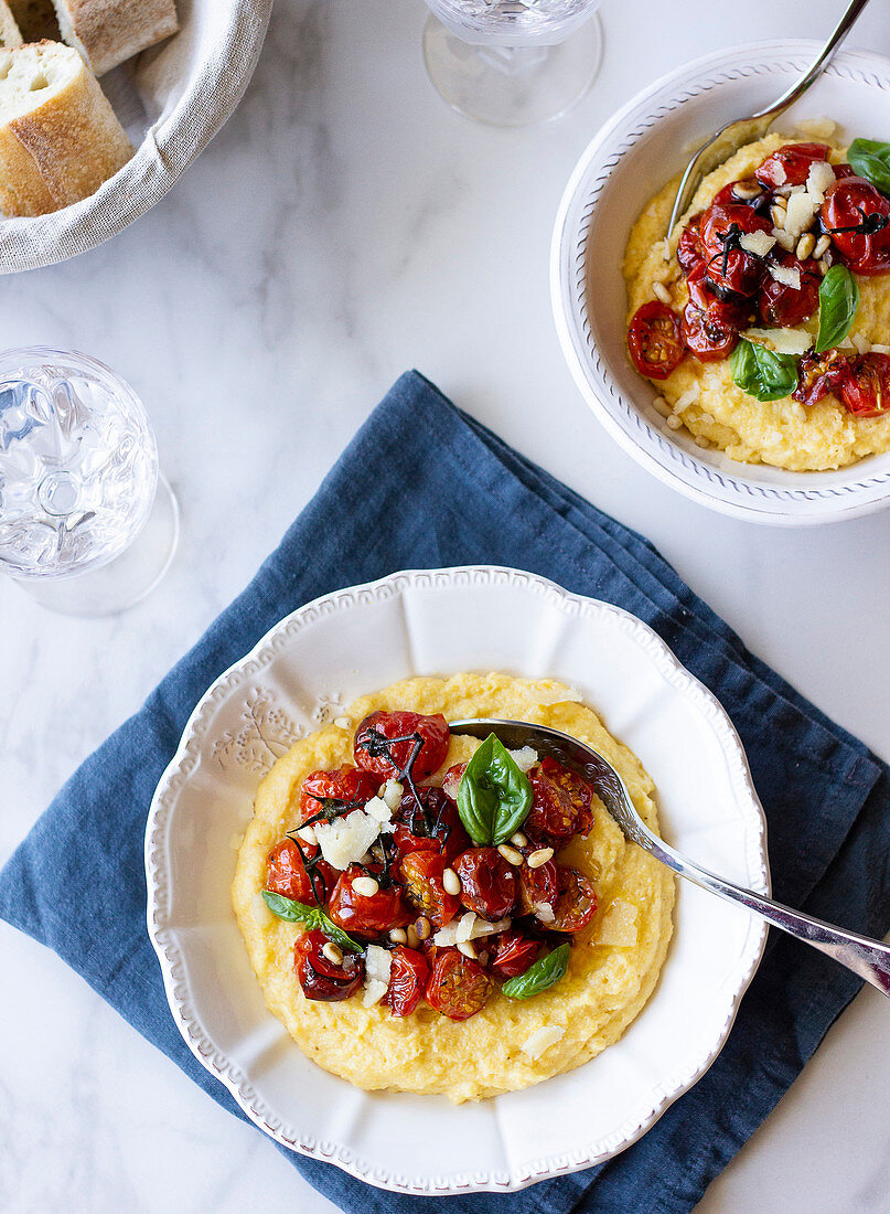 Polenta with cherry tomatoes, parmesan and pine nuts