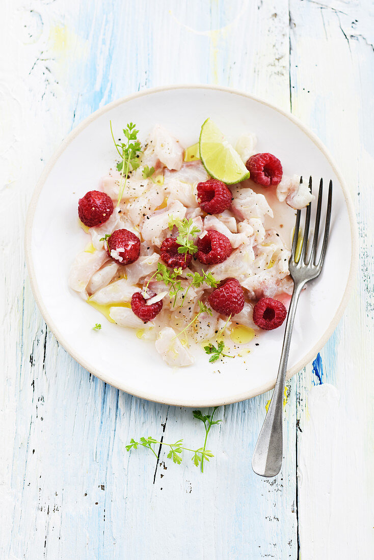Ceviche with gilthead and raspberries