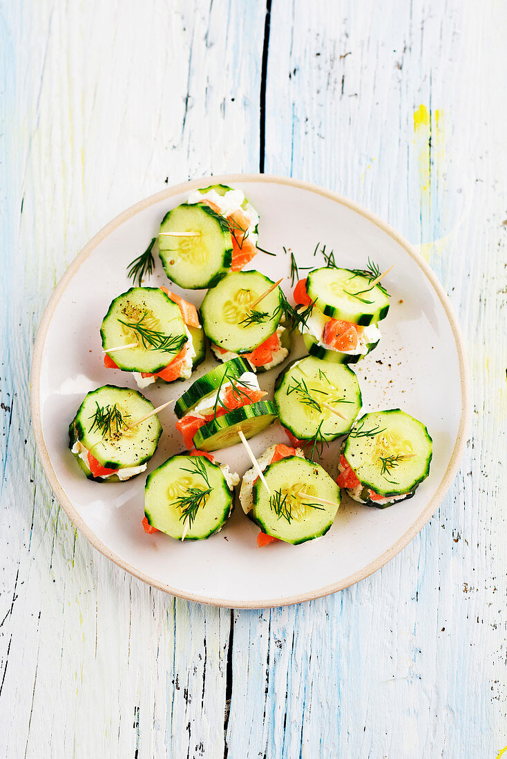 Mini cucumber sandwiches with salmon and cream cheese