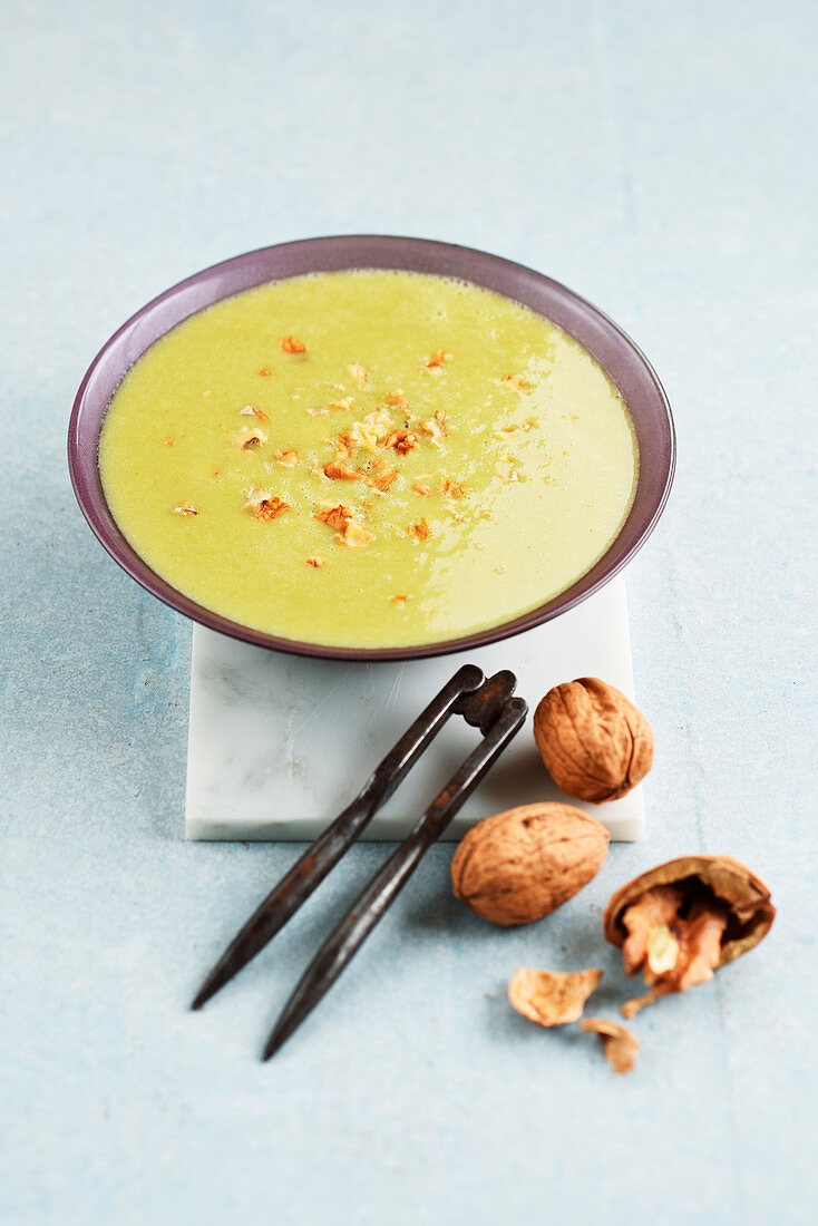 Broccoli soup with roquefort and walnuts
