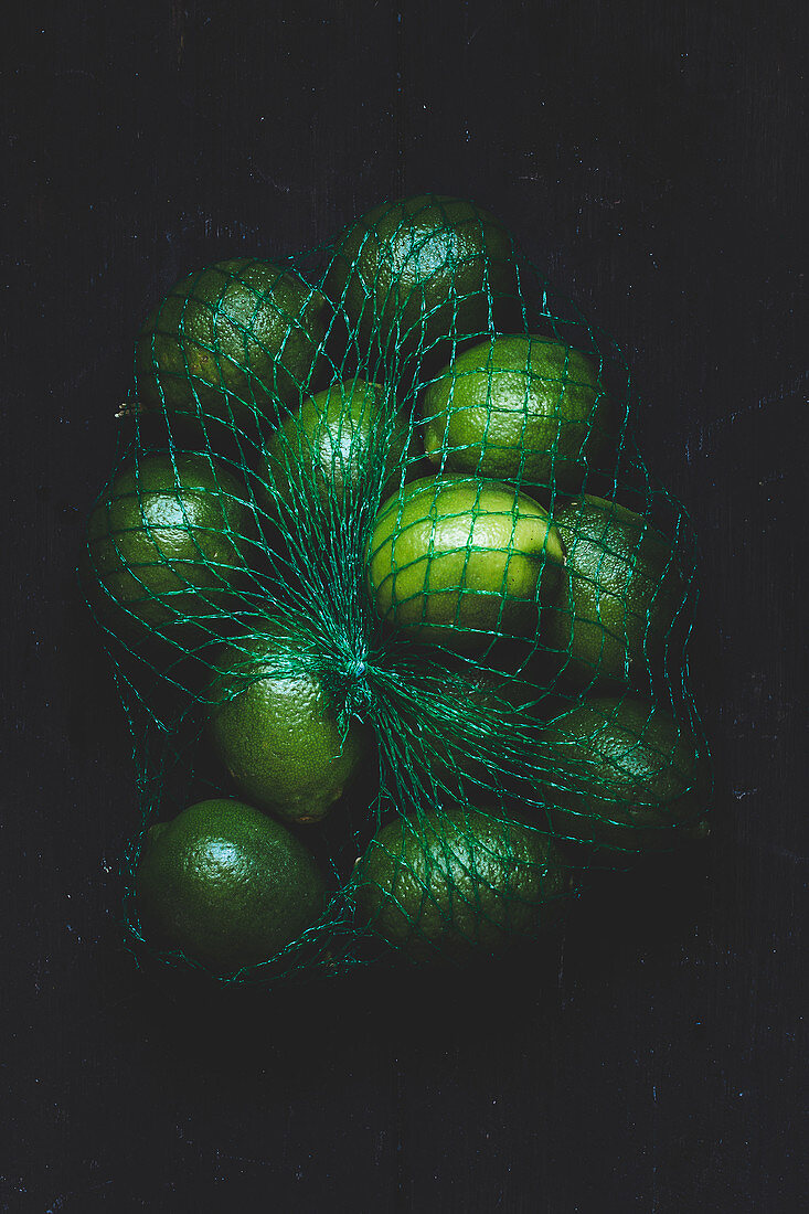 Limes in a shopping net