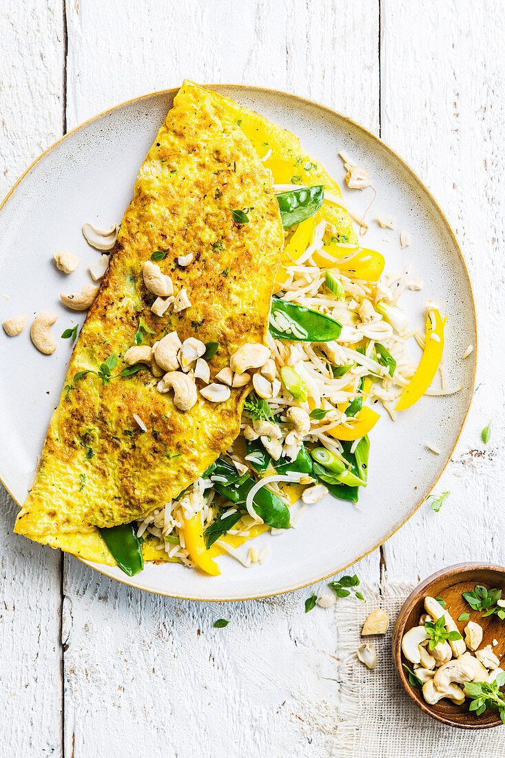 Chinese rice omelette with vegetables and cashew nuts