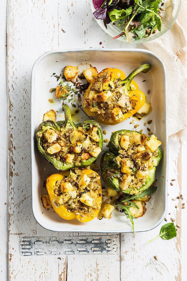 Oven baked peppers stuffed with artichokes and halloumi