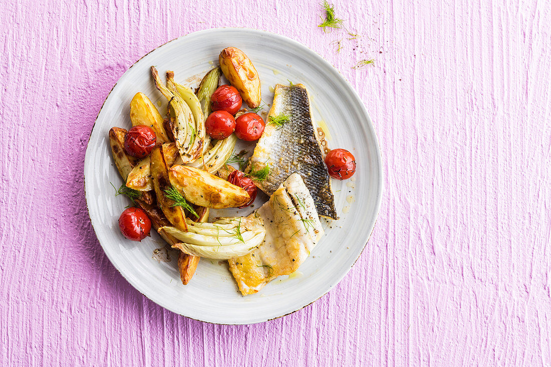 Fillet of fish with fennel, cherry tomato and potatoes