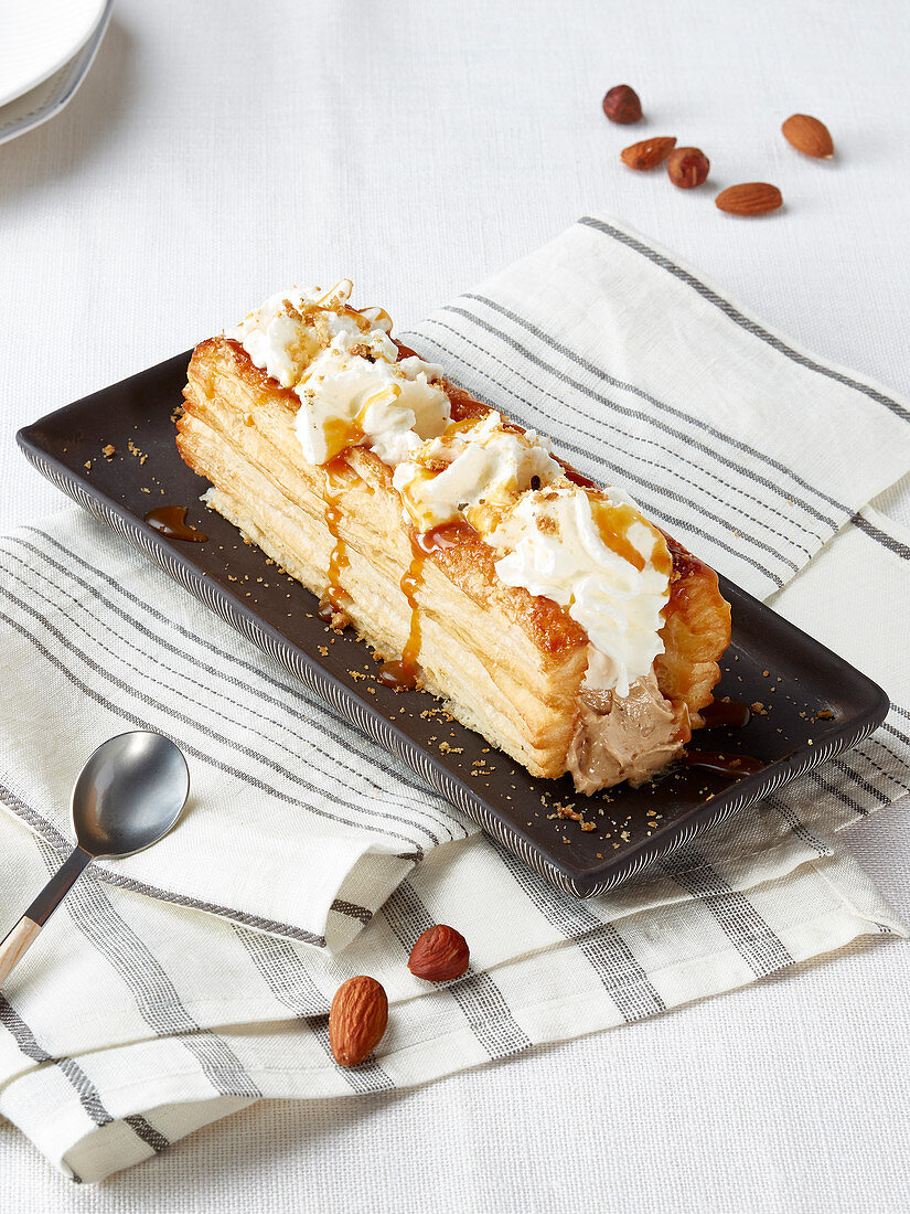 Caramel mille-feuille with almonds and cream