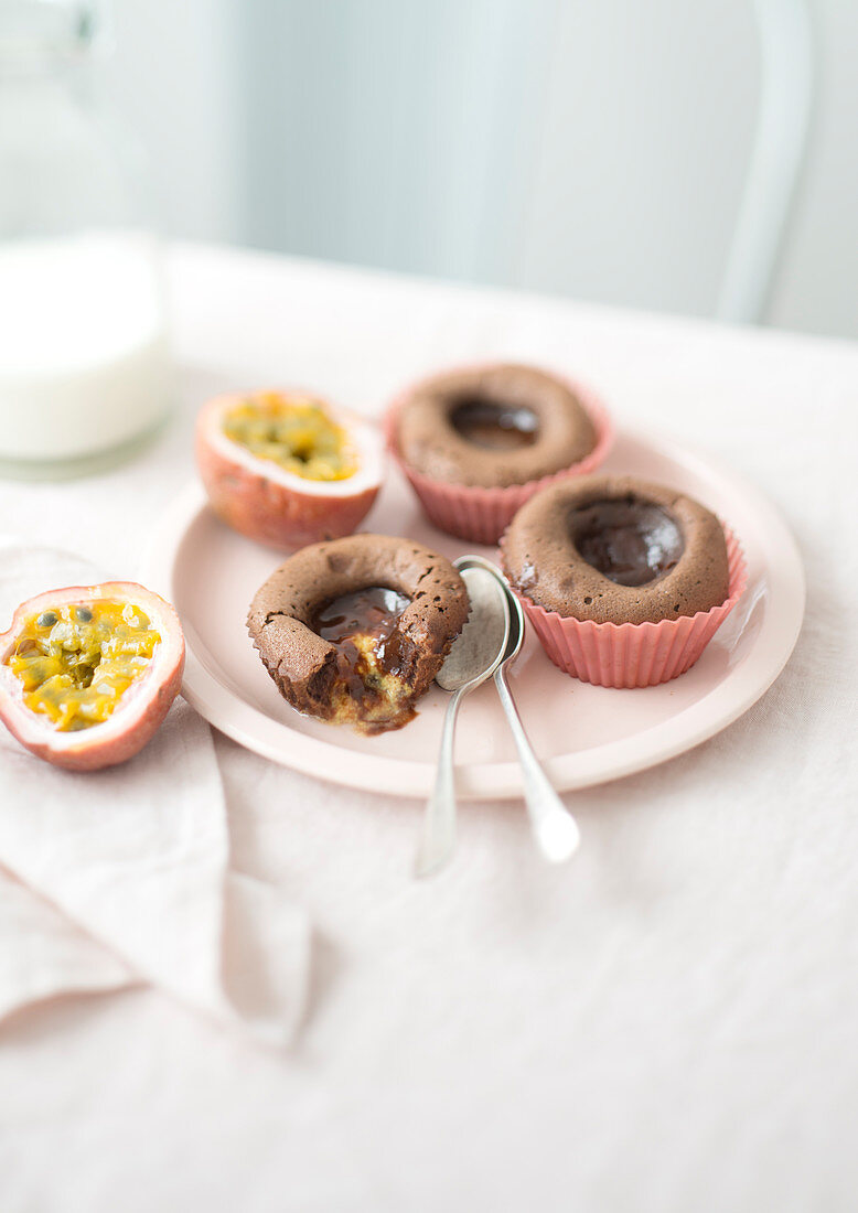 Chocolate tartlets with passion fruit centres