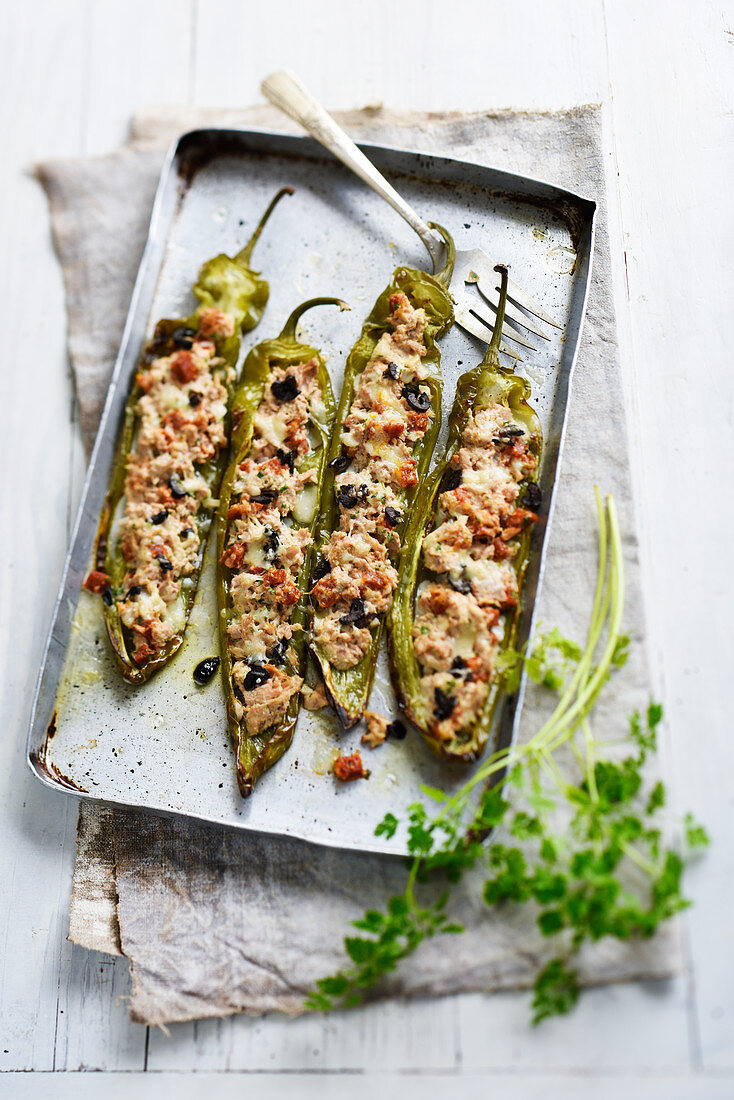 Peppers stuffed with tuna, chorizo, onions and olives