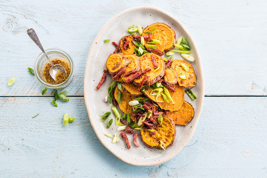 Sweet potatoes with bacon and mustard sauce