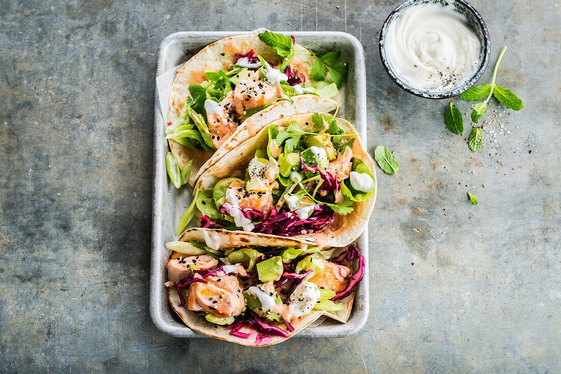 Salmon tacos and red cabbage