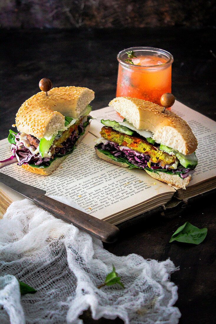 Vegetarian bagel sandwich with orange and thyme drink