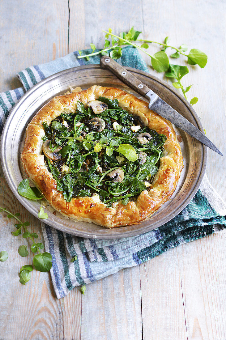 Puff pastry tart with ricotta, watercress and mushrooms