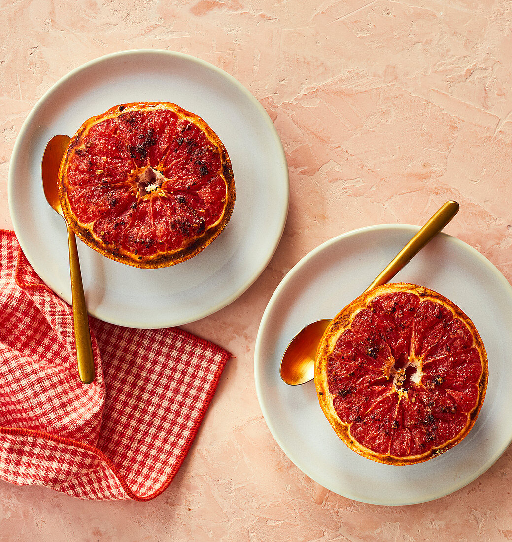 Pink grapefruit halves grilled with cinnamon