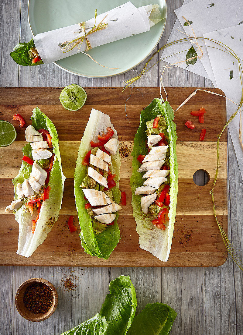 Mexican wraps with romaine lettuce, chicken breast and peppers