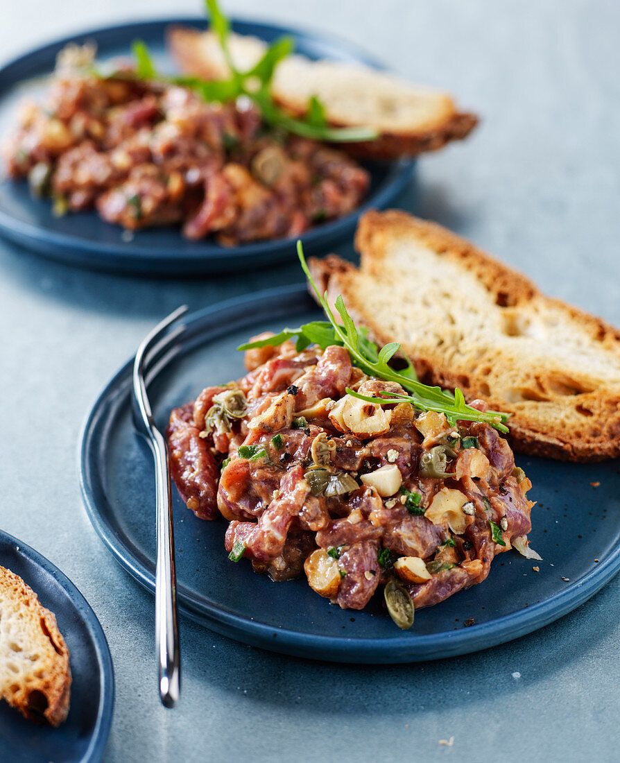 Duck tartare served with toasted bread