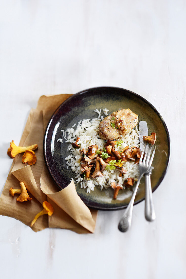 Monkfish on rice with chanterelles