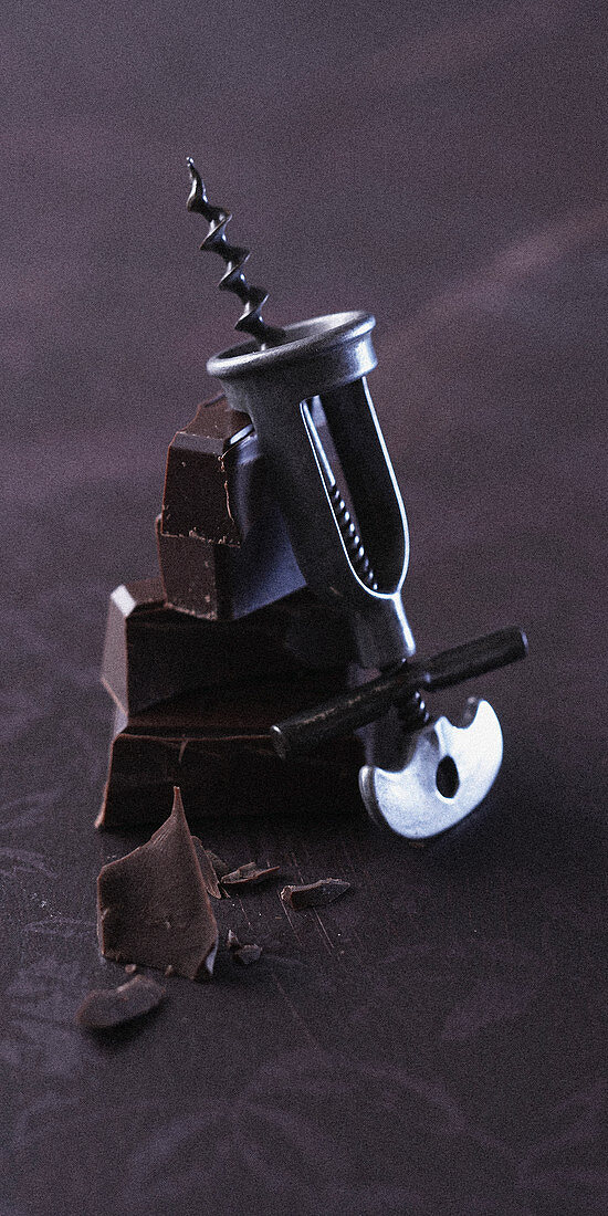 Chocolate pieces and a corkscrew