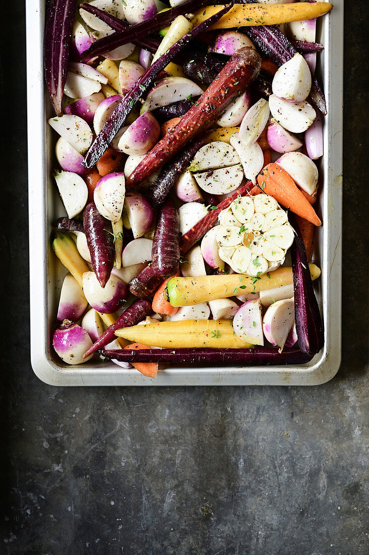 Unroasted vegetables on a baking tray
