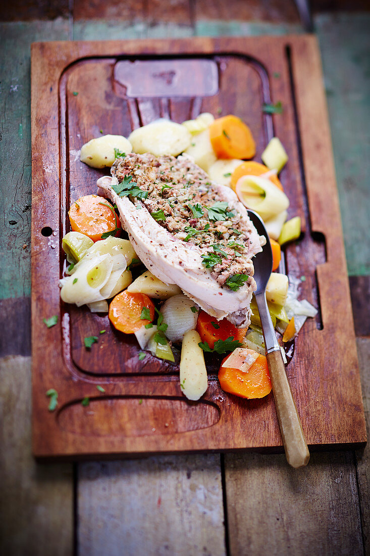 Chicken stuffed with small vegetables