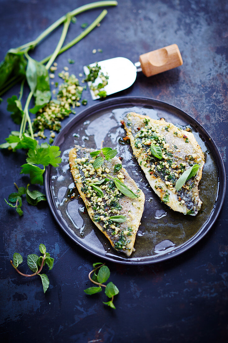 Sea bream with pine nut, basil and mint a la plancha