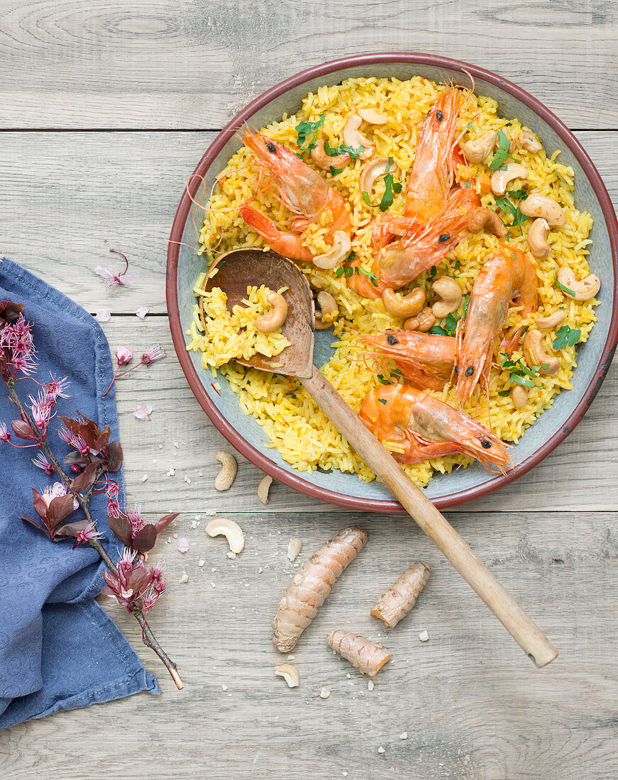 Biryani with prawns, cashew nuts and turmeric