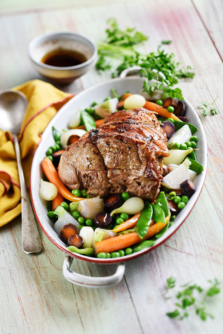 Saddle of lamb roast with spring vegetables