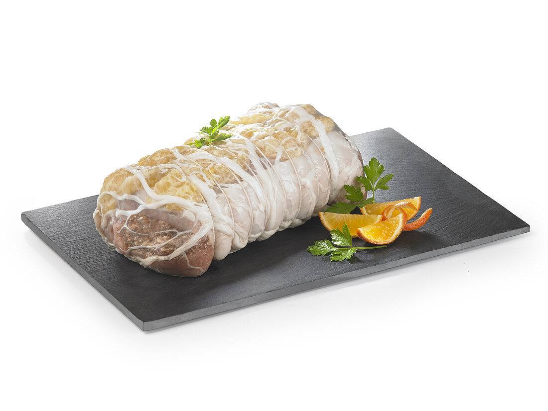 Raw roast pork with clementines and honey