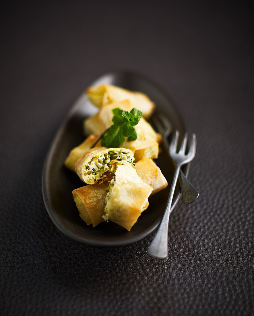 Dumplings with feta, courgette and mint