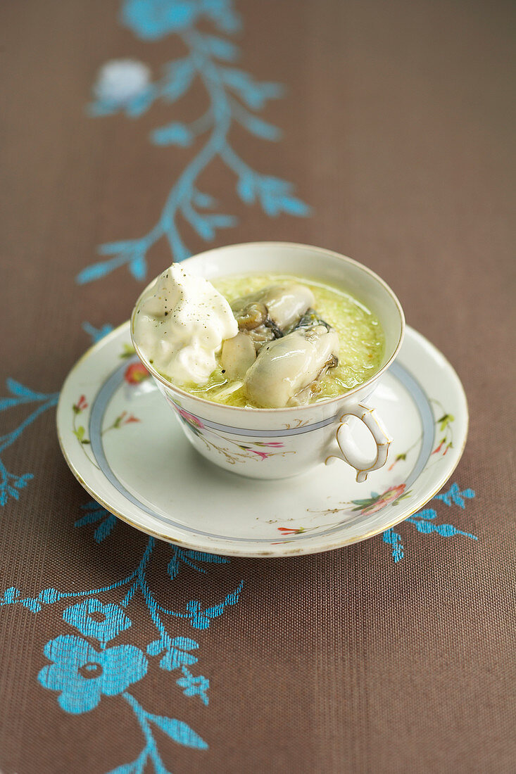 Cappuccino with almond cream and oysters