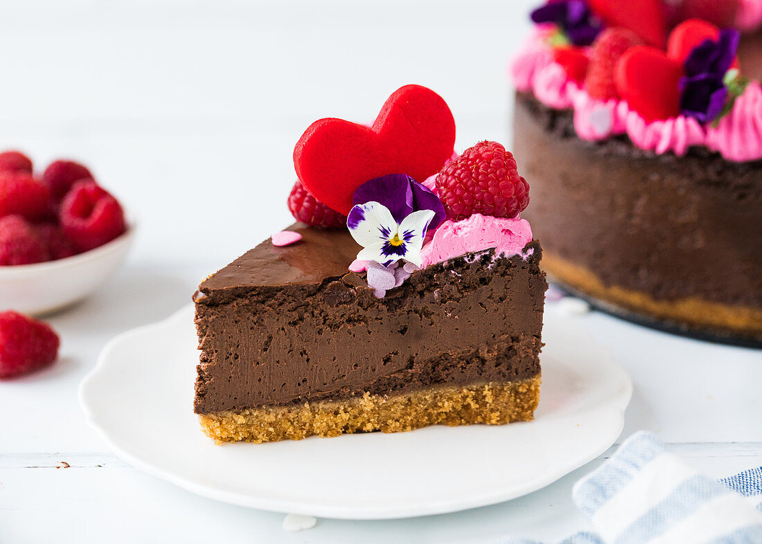 Slice of chocolate cheese cake with raspberry mousse