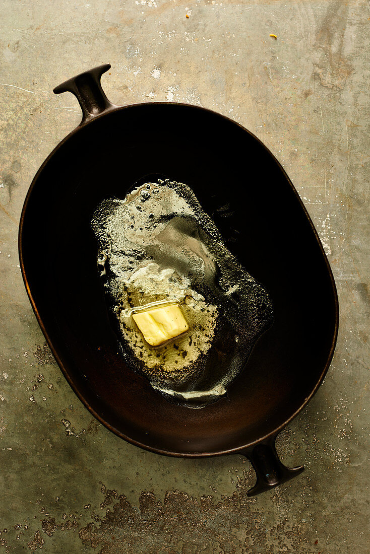 Butter melting in a casserole dish