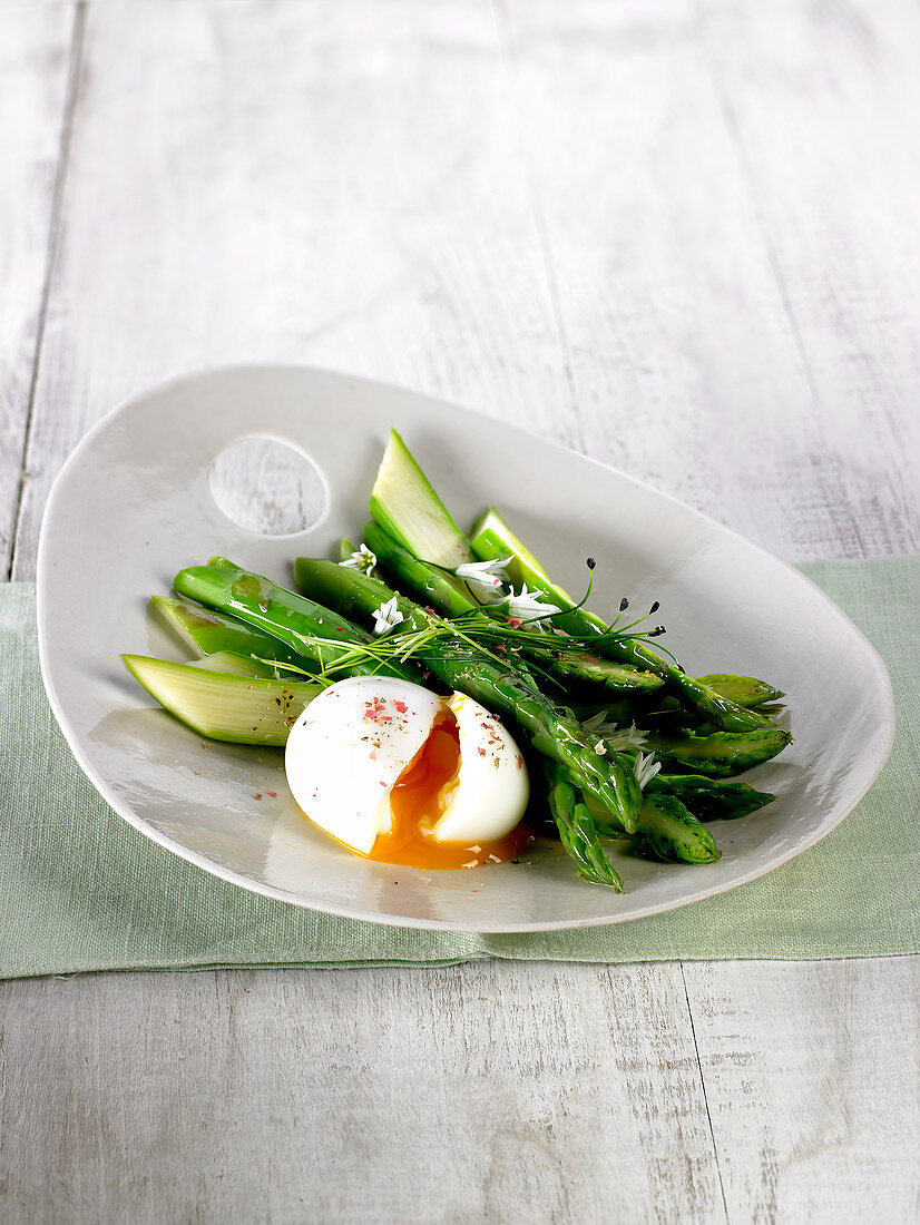 Green asparagus with a soft boiled egg