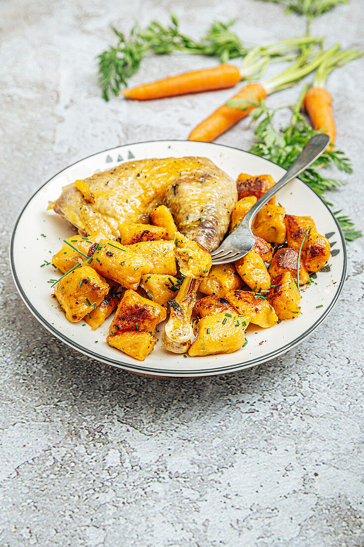 Chicken with carrot and carrot tops gnocchis