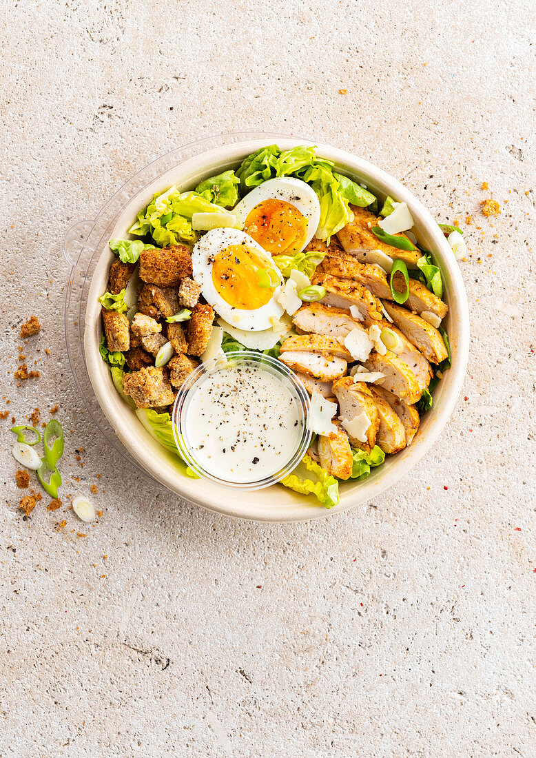 Caesar salad with chicken breasts